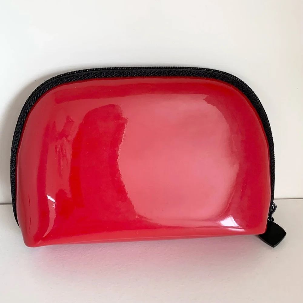 Hold Chanel Red zippy pouch
